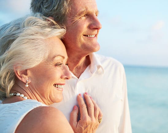 Senior Couple Smiling on a Beach