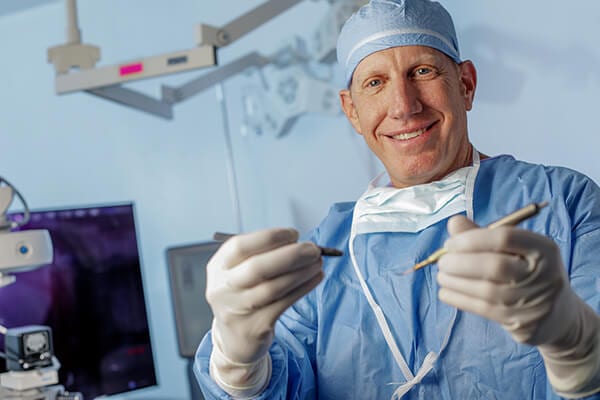 Ophthalmologist smiling after surgery