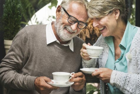 Older couple celebrating after retina surgery