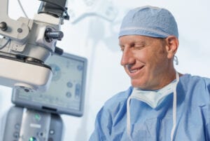 Ophthalmologist smiling after performing surgery